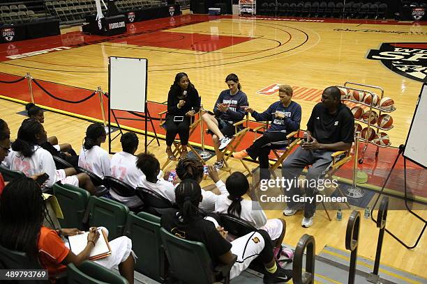 Shelley Patterson, assisstant coach of the Minnesota Lynx, Stephanie White, assisstant coach of the Indiana Fever and Tree Rollins, assisstant coach...