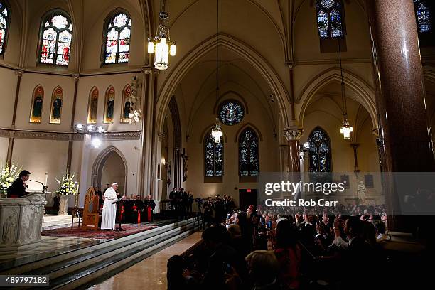 Pope Francis gestures while talking with those gathered at St. Patrick's Catholic Church on September 24, 2015 in Washington, DC. The Pope is on a...