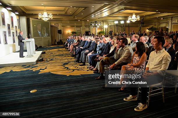 Attendees listen as PGA TOUR Commissioner Tim Finchem speaks during the Payne Stewart Award ceremony for Ernie Els, held following practice for the...