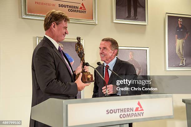 Commissioner Tim Finchem presents Ernie Els with the Payne Stewart Award during a ceremony held following practice for the TOUR Championship by...