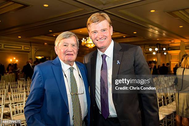 Ernie Els poses with philanthropist Tom Cousins after Els received the Payne Stewart Award during a ceremony held following practice for the TOUR...