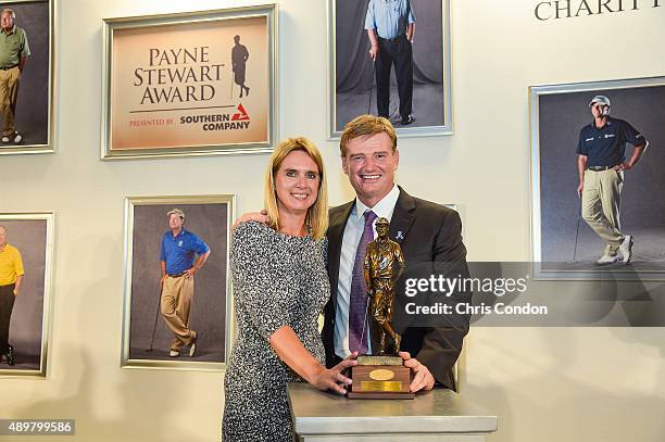 Payne Stewart Award recipient Ernie Els and his wife Liezl Els pose at an award ceremony held following practice for the TOUR Championship by...