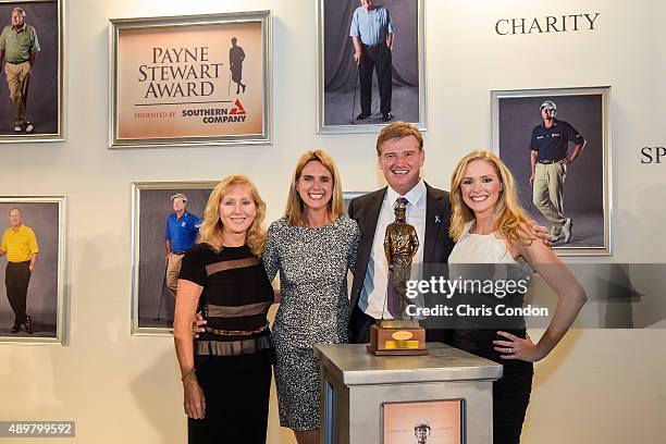 Payne Stewart Award recipient Ernie Els poses with the late Stewart's wife Tracey Stewart, his wife Liezl Els, and Chelsea Stewart at an award...