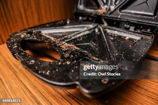 Dirty scratched sandwich toaster Dirty scratched sandwich toaster