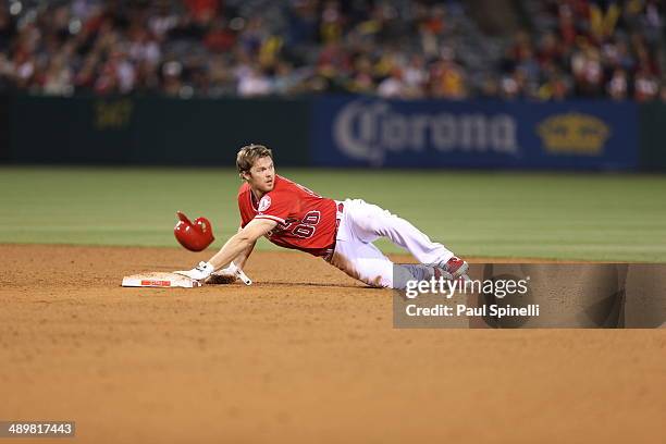 Brennan Boesch of the Los Angeles Angels steals second base in the bottom of the 10th inning during the game against the Oakland Athletics at Angel...