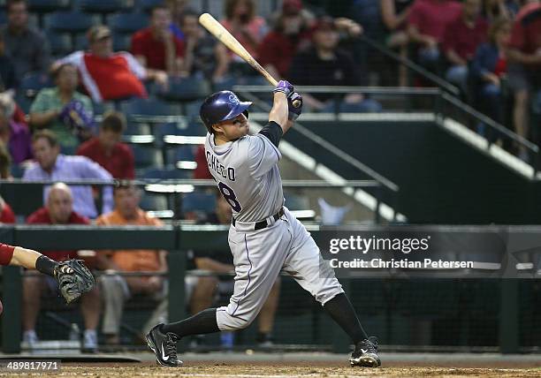 Jordan Pacheco of the Colorado Rockies bats against the Arizona Diamondbacks during the MLB game at Chase Field on April 30, 2014 in Phoenix,...