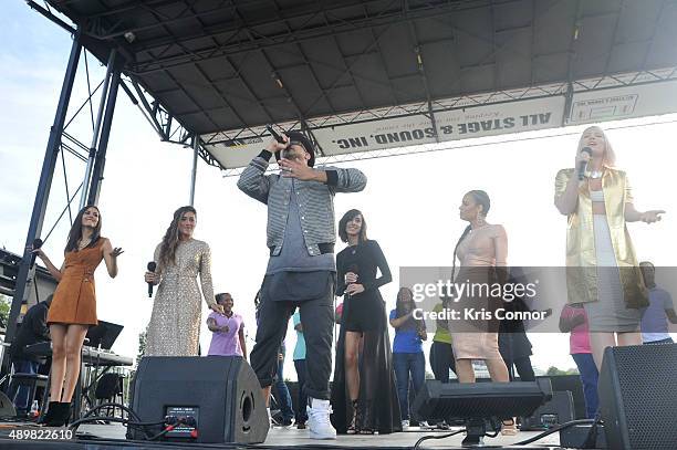 Singers Sean Paul, Victoria Justice, Q'orianka Kilcher, Christina Grimmie, Antonique Smith and Natasha Bedingfield perform during the "Rally for...