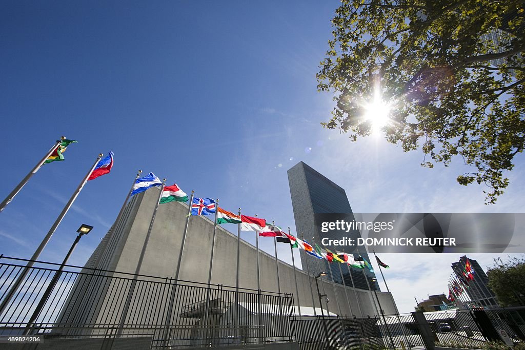 International flags fly in front of the United Nations headquarters ...