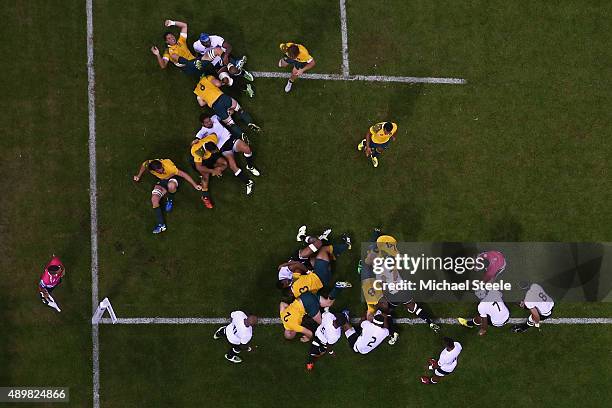 David Pocock of Australia scores his sides opening try during the 2015 Rugby World Cup Pool A match between Australia and Fiji at Millennium Stadium...