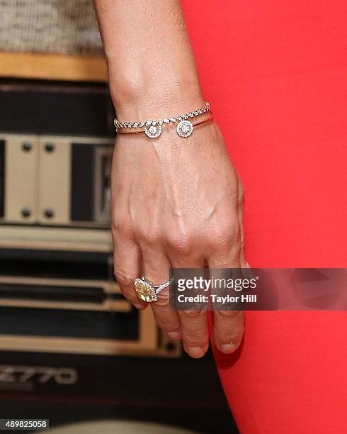 Actress Ashley Judd, bracelet detail, ring detail, attends a photocall for "Big Stone Gap" at Ace Hotel on September 24, 2015 in New York City.