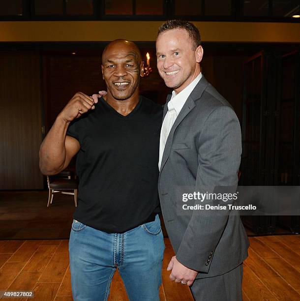 Mike Tyson and Richard Klamka pose for a photo at Off The Strip at The LINQ on September 24, 2015 in Las Vegas, Nevada.