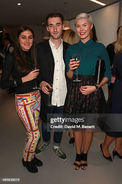 Magdalena Poppy Moursy, Hugo Wheeler and Nia Grocott at Huxley And Cox / Nina Naustdal Pop-Up Boutique on the Kings road on September 24, 2015 in...