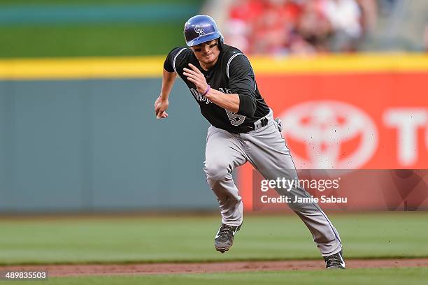 Jordan Pacheco of the Colorado Rockies runs the bases against the Cincinnati Reds at Great American Ball Park on May 10, 2014 in Cincinnati, Ohio.