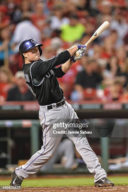 Jordan Pacheco of the Colorado Rockies bats against the Cincinnati Reds at Great American Ball Park on May 10, 2014 in Cincinnati, Ohio.