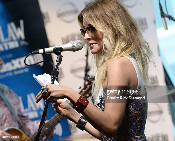 Recording Artist Elizabeth Cook announces the nominees during the Americana Music Association 2014 Award Nominees Announcement at SIRIUS XM Studio on...