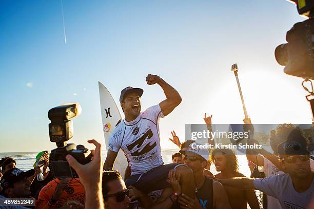 Michel Bourez of Tahiti celebrates his victory at the Billabong Rio Pro on May 12, 2014 in Rio de Janeiro, Brazil.