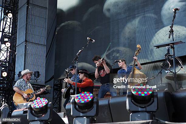 Musicians Critter Fuqua, Kevin Hayes, Chance McCoy, Ketch Secor and Morgan Jahnig from Old Crow Medicine Show performs at FirstMerit Bank Pavilion at...