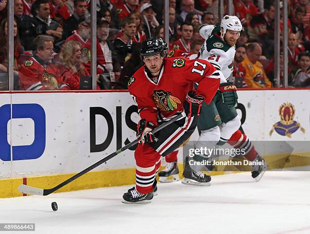 Sheldon Brrokbank of the Chicago Blackhawks looks to pas against the Minnesota Wild in Game Five of the Second Round of the 2014 NHL Stanley Cup...