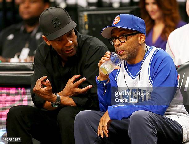 Denzel Washington and Spike Lee attend Game Four of the Eastern Conference Semifinals during the 2014 NBA Playoffs at the Barclays Center on May 12,...