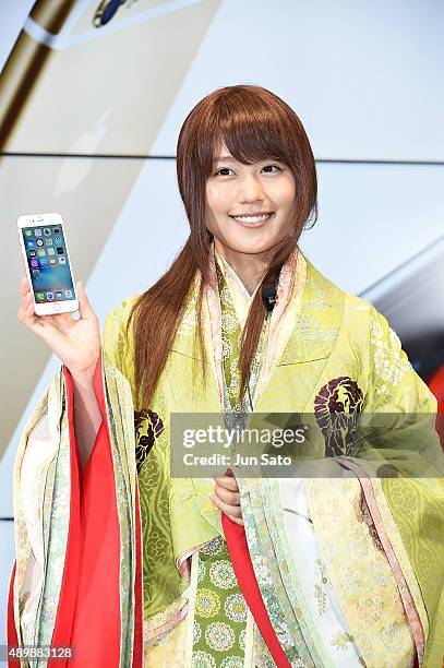 Actress Kasumi Arimura attends the news conference of launching iPhone 6s and 6s Plus at AU Shinjuku flagship store on September 25, 2015 in Tokyo,...