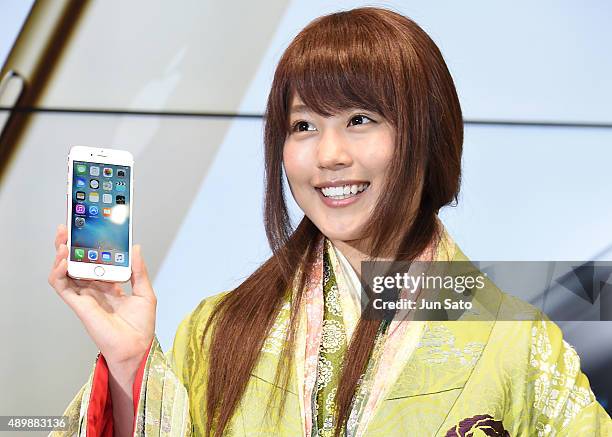 Actress Kasumi Arimura attends the news conference of launching iPhone 6s and 6s Plus at AU Shinjuku flagship store on September 25, 2015 in Tokyo,...