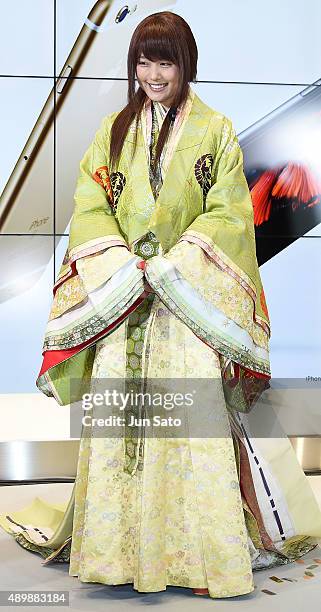 Actress Kasumi Arimura attends the news conference of launching iPhone 6s and 6s Plus at AU Shinjuku flagship store on September 25, 2015 in Tokyo,...