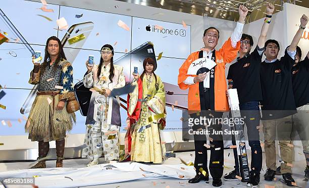Actress Kasumi Arimura, actors Shota Matsuda, Kenta Kiritani and CEO of KDDI Takashi Tanaka attend the news conference of launching iPhone 6s and 6s...