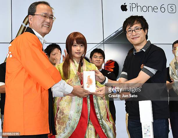 Of KDDI Takashi Tanaka and actress Kasumi Arimura and guest attend the news conference of launching iPhone 6s and 6s Plus at AU Shinjuku flagship...
