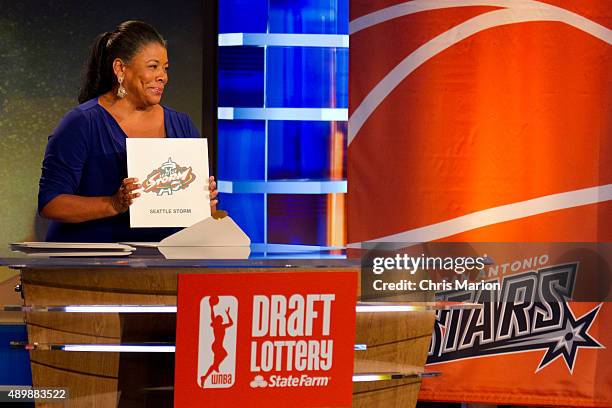 Laurel J. Richie, President of the WNBA, holds up the card for the 1st overall pick during the 2015 WNBA Draft Lottery at ESPN Studios on September...