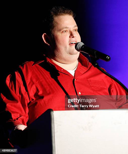 Comedian Ralphie May speaks onstage during the T.J. Martell Ambassador Of The Year Awards at The Rosewall on May 12, 2014 in Nashville, Tennessee.