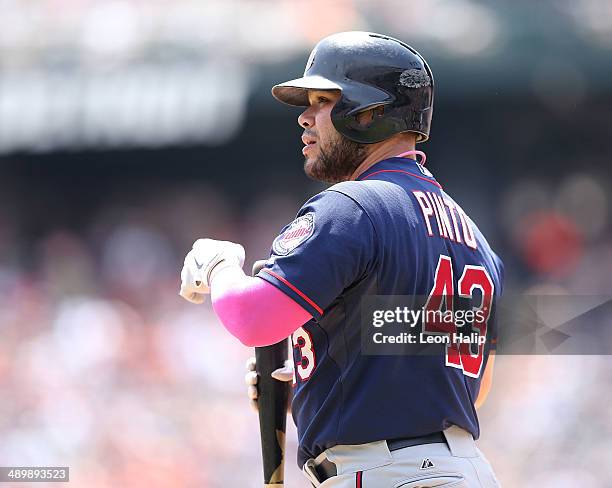 Josmil Pinto of the Minnesota Twins looks into the dugout during the seventh inning of the game against the Detroit Tigers at Comerica Park on May...