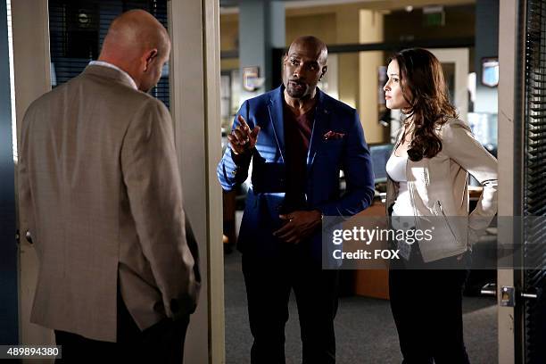 Pictured L-R: Domenick Lombardozzi as Capt. Ira Hornstock, Morris Chestnut as Dr. Beaumont Rosewood, Jr. And Jaina Lee Ortiz as Detective Annalise...