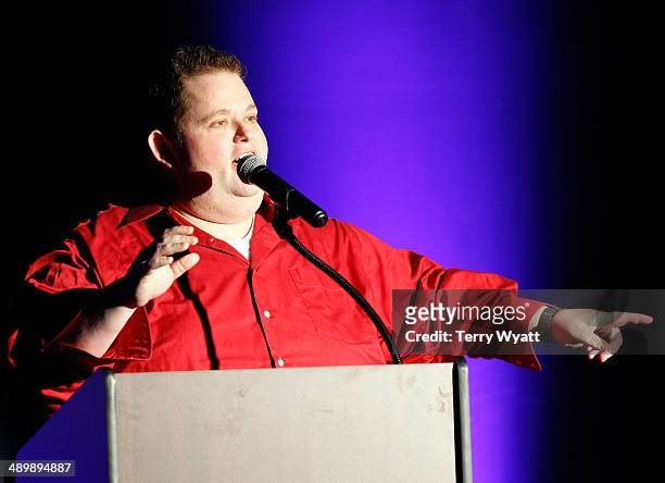 Comedian Ralphie May speaks onstage during the T.J. Martell Ambassador Of The Year Awards at The Rosewall on May 12, 2014 in Nashville, Tennessee.