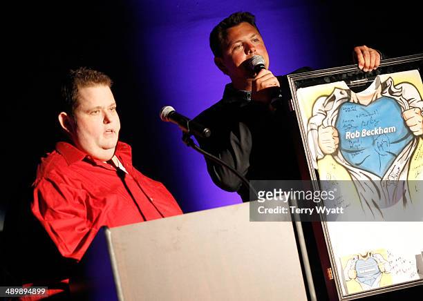 Comedian Ralphie May and Storme Warren speak onstage during the T.J. Martell Ambassador Of The Year Awards at The Rosewall on May 12, 2014 in...