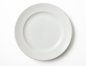 Isolated shot of empty white plate on white background