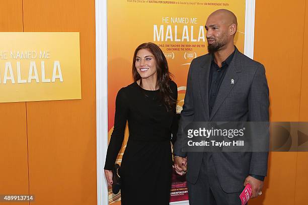 Hope Solo and Jerramy Stevens attend the "He Named Me Malala" premiere at Ziegfeld Theater on September 24, 2015 in New York City.