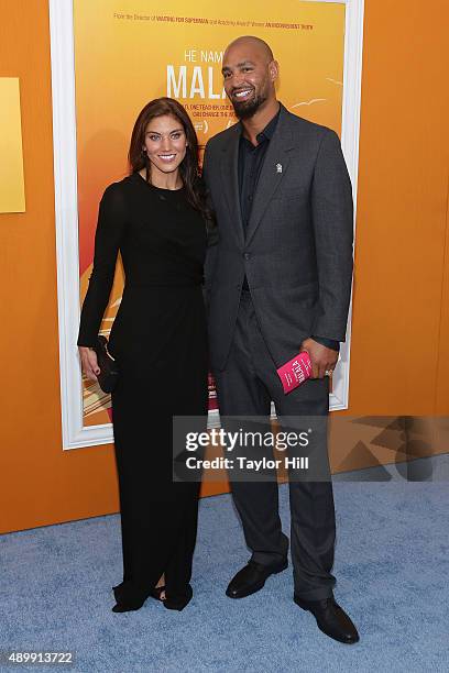 Hope Solo and Jerramy Stevens attend the "He Named Me Malala" premiere at Ziegfeld Theater on September 24, 2015 in New York City.