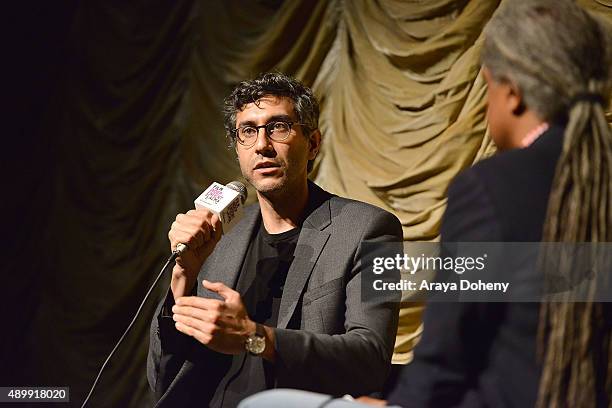 Ramin Bahrani and Elvis Mitchell attend the Film Independent at LACMA screening and Q&A of "99 Homes" at Bing Theatre At LACMA on September 24, 2015...