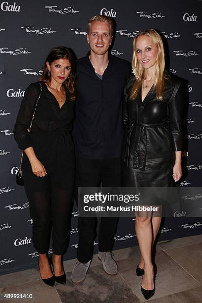 Actress Anna Angelina Wolfers, Model Mario Galla and editor in chief of GALA, Anne Meyer-Minnemann attend the Thomas Sabo grand flagship store...