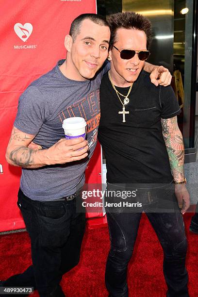 Steve-O and Billy Morrison arrive at the 2014 MusiCares MAP Fund Benefit Concert at Club Nokia on May 12, 2014 in Los Angeles, California.