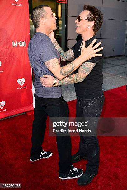 Steve-O and Billy Morrison arrive at the 2014 MusiCares MAP Fund Benefit Concert at Club Nokia on May 12, 2014 in Los Angeles, California.