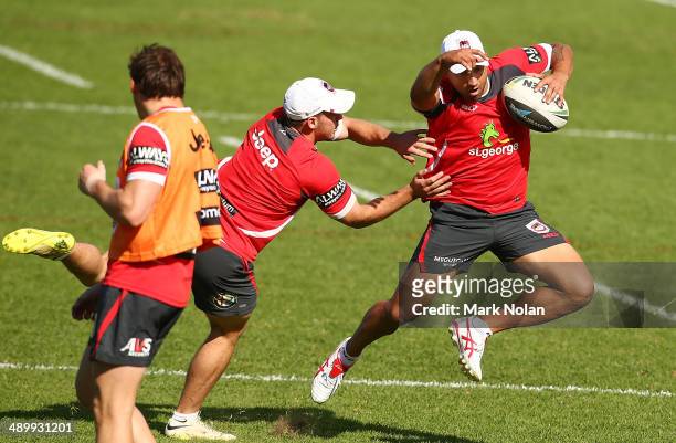 Benji Marshall runs the ball during a St George Illawarra Dragons NRL training session at WIN Stadium on May 13, 2014 in Wollongong, Australia.