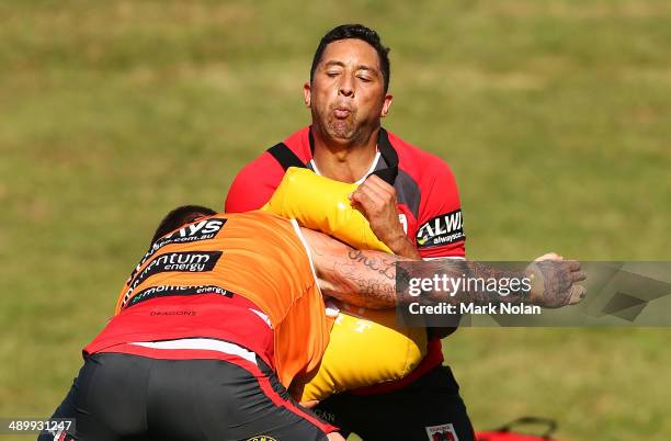 Benji Marshall takes part in a defensive drill during a St George Illawarra Dragons NRL training session at WIN Stadium on May 13, 2014 in...