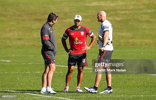 Dragons coach Steve Price, Benji Marshall and Paul McGregor chat during a St George Illawarra Dragons NRL training session at WIN Stadium on May 13,...
