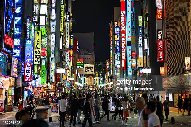 tokyo in the night - kabuki cho stock pictures, royalty-free photos & images