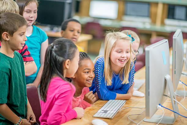 Computer Games For Classes 2,937 Kid Computer Class Stock Photos, High-Res Pictures, and Images ...