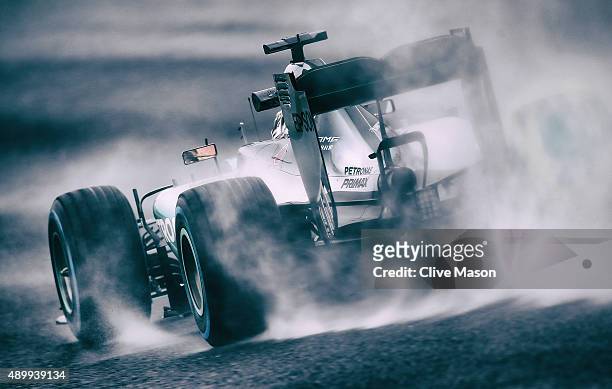 Lewis Hamilton of Great Britain and Mercedes GP drives during practice for the Formula One Grand Prix of Japan at Suzuka Circuit on September 25,...