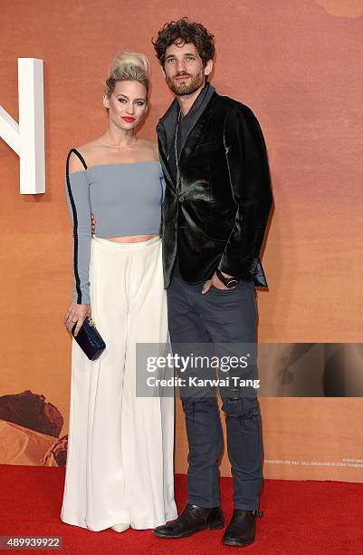 Kimberly Wyatt and Max Rogers attend the European premiere of "The Martian" at Odeon Leicester Square on September 24, 2015 in London, England.