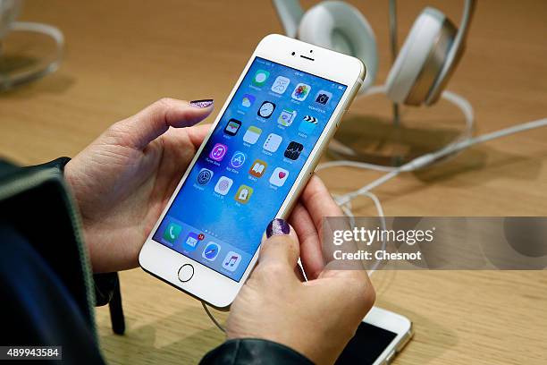 Customer checks the new iPhone 6s displayed at the Apple Store Opera on September 25, 2015 in Paris, France. Apple launched the new iPhone 6s and...