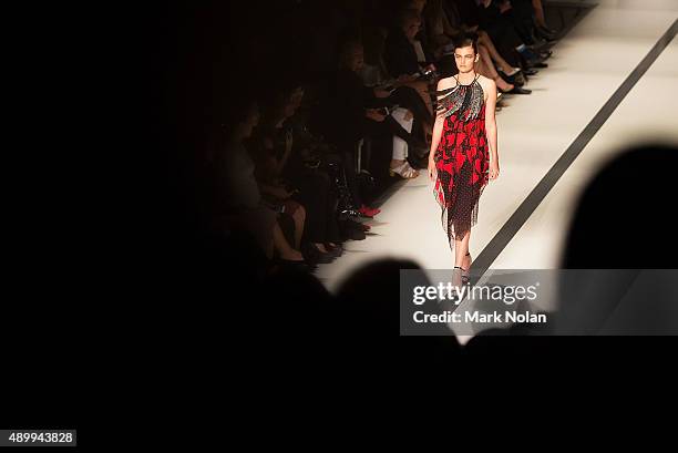 Model showcases designs during the Australian Luxe show at Mercedes-Benz Fashion Festival Sydney 2015 at Sydney Town Hall on September 25, 2015 in...